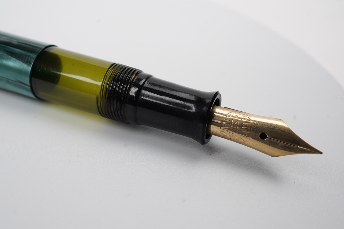 A Pelikan 100N fountain pen fitted with a 14ct. gold Pelkan nib
